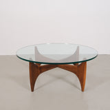 Vintage mid-century coffee table with teak base and glass top