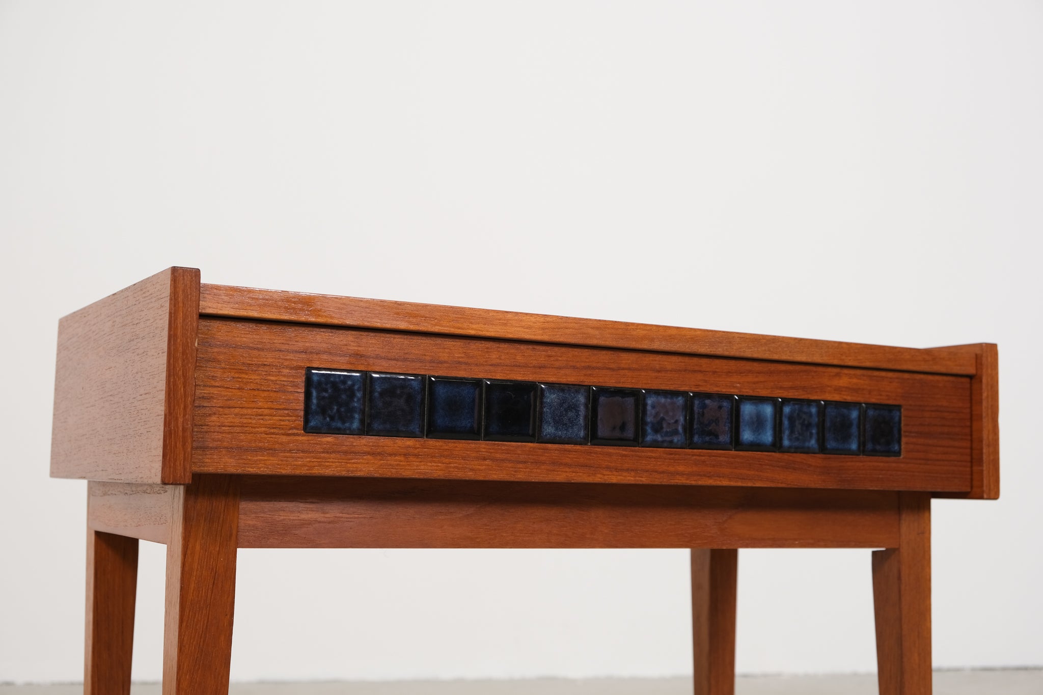 Large cabinet with blue tiles